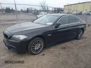 2014 BMW 5 Series 535d with VIN WBAXA5C51ED691018, listed as a IAAI auction lot 41887112 with 174,684 mi miles and . Bid and sale history available at carsss.com. Image 2.