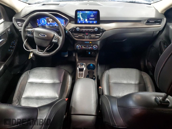 2020 Ford Escape Titanium z VIN 1FMCU9J98LUA93393, wystawiony jako Copart lot #65366925 z przebiegiem 74 750 mil mil oraz Czysty tytuł • Clean title. Historia ofert i sprzedaży dostępna na DreamBid. Obrazek 8.