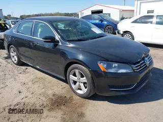 2013 Volkswagen Passat SE w/Sunroof with VIN 1VWBH7A36DC020984, listed as a IAAI auction lot 41883902 with 169,916 mi miles. Bid and sale history available at carsss.com. Image 1.