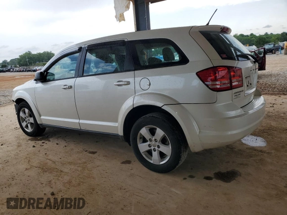 2013 Dodge Journey American Value with VIN 3C4PDCAB5DT656997, listed as a Copart auction lot 57123565 with 201,799 mi miles and Salvage title. Bid and sale history available at DreamBid. Image 2.