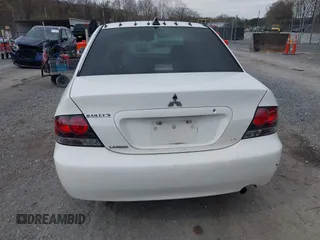 2005 Mitsubishi Lancer ES with VIN JA3AJ26E15U011460, listed as a IAAI auction lot 41955427 with 343,559 mi miles. Bid and sale history available at carsss.com. Image 16.