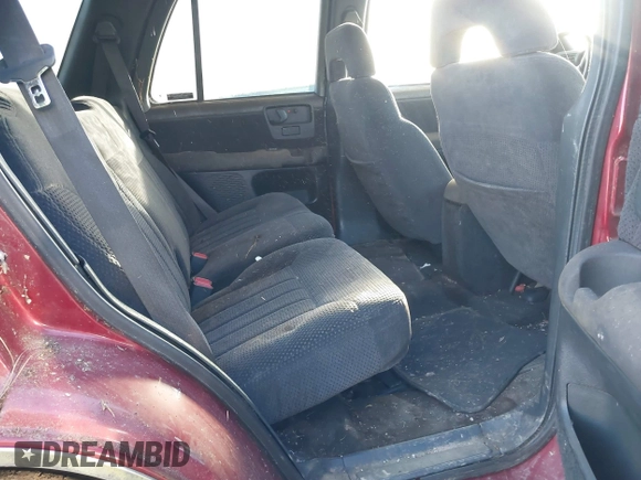 1997 Chevrolet Blazer LS z VIN 1GNDT13W3V2232285, wystawiony jako IAAI lot #41710231 z przebiegiem 1 930 079 mil mil oraz . Historia ofert i sprzedaży dostępna na DreamBid. Obrazek 8.