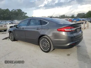 2017 Ford Fusion Titanium z VIN 3FA6P0SU0HR290201, wystawiony jako Copart lot #60106095 z przebiegiem 98 086 mil mil oraz Szkoda całkowita • Salvage title. Historia ofert i sprzedaży dostępna na DreamBid. Obrazek 2.