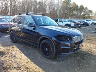 2016 BMW X5 eDrive xDrive40e with VIN 5UXKT0C5XG0S76007, listed as a IAAI auction lot 41463768 with 111,337 mi miles. Bid and sale history available at carsss.com. Image 1.