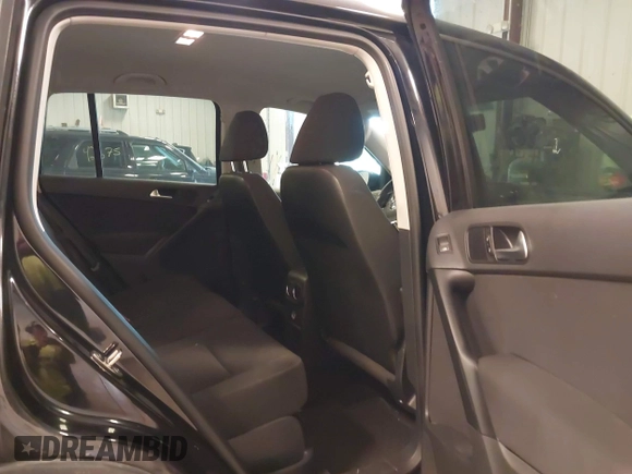 2014 Volkswagen Tiguan SE z VIN WVGAV3AX9EW614094, wystawiony jako IAAI lot #42350601 z przebiegiem 128 996 mil mil oraz . Historia ofert i sprzedaży dostępna na DreamBid. Obrazek 8.