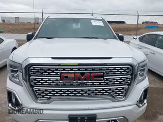 2022 GMC Sierra 1500 Denali with VIN 3GTU9FELXNG127029, listed as a IAAI auction lot 42062882 with 24,082 mi miles and . Bid and sale history available at DreamBid. Image 12.