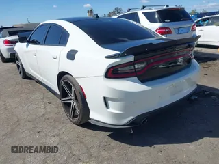 2019 Dodge Charger R/T with VIN 2C3CDXCT4KH681945, listed as a IAAI auction lot 41922885 with 73,769 mi miles and . Bid and sale history available at carsss.com. Image 3.