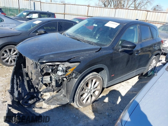 2013 Mazda CX-5 Grand Touring with VIN JM3KE2DE1D0164723, listed as a IAAI auction lot 41364590 with 227,932 mi miles. Bid and sale history available at carsss.com. Image 2.