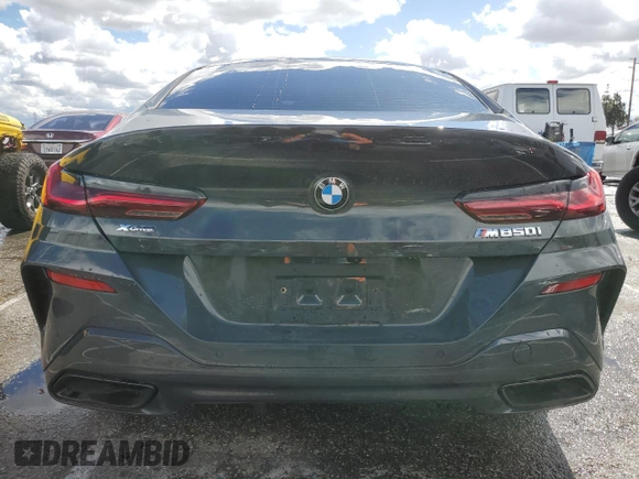 2025 BMW 8 Series M850i with VIN WBAGV8C07SCT18237, listed as a Copart auction lot 49277375 with 750 mi miles and Salvage title. Bid and sale history available at DreamBid. Image 6.
