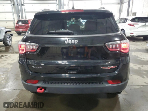2019 Jeep Compass Trailhawk with VIN 3C4NJDDB4KT647187, listed as a Copart auction lot 50260575 with 63,098 mi miles and Salvage Title. Bid and sale history available at carsss.com. Image 6.