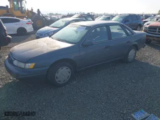 1993 Ford Taurus GL with VIN 1FALP5240PG327124, listed as a IAAI auction lot 42074204 with 27,681 mi miles. Bid and sale history available at carsss.com. Image 2.