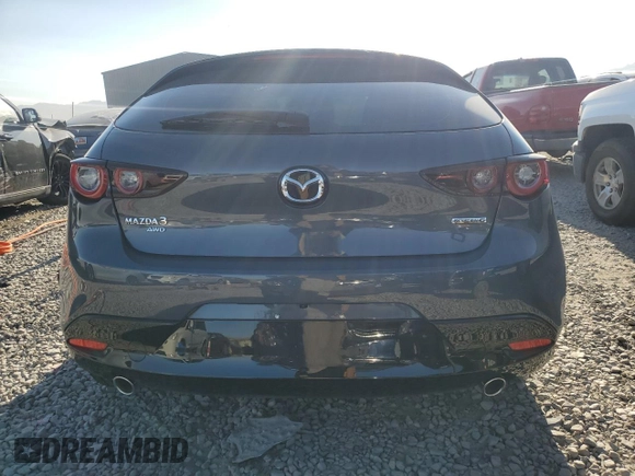 2024 Mazda 3 S Carbon Edition with VIN JM1BPBLM4R1714705, listed as a Copart auction lot 69140474 with 1,808 mi miles and Salvage Title. Bid and sale history available at DreamBid. Image 6.