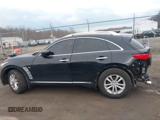 2016 Infiniti QX70 z VIN JN8CS1MWXGM752436, wystawiony jako IAAI lot #41681170 z przebiegiem 130 208 mil mil oraz . Historia ofert i sprzedaży dostępna na DreamBid. Obrazek 14.