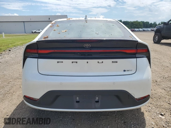 2024 Toyota Prius LE with VIN JTDADABU9R3014585, listed as a Copart auction lot 64608015 with 3,773 mi miles and Salvage title. Bid and sale history available at DreamBid. Image 6.