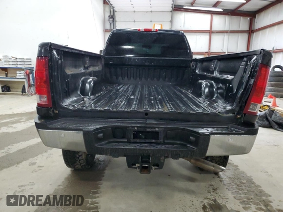 2012 GMC Sierra 2500HD SLE z VIN 1GT120CG6CF169156, wystawiony jako Copart lot #52860205 z przebiegiem 106 505 mil mil oraz Szkoda całkowita • Salvage title. Historia ofert i sprzedaży dostępna na DreamBid. Obrazek 6.