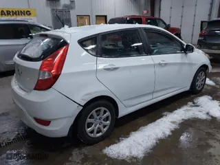 2012 Hyundai Accent GS with VIN KMHCT5AE8CU042470, listed as a IAAI auction lot 41021964 with 94,574 mi miles. Bid and sale history available at carsss.com. Image 4.