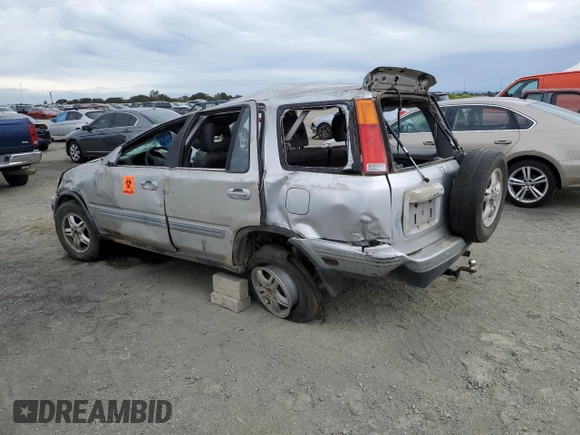 2001 Honda CR-V SE with VIN JHLRD18751C033260, listed as a Copart auction lot 76145264 with 246,276 mi miles and Salvage Title. Bid and sale history available at carsss.com. Image 2.