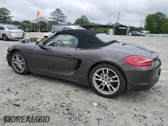 2015 Porsche Boxster with VIN WP0CA2A88FS120121, listed as a Copart auction lot 50591195 with 71,836 mi miles and Salvage title. Bid and sale history available at DreamBid. Image 2.