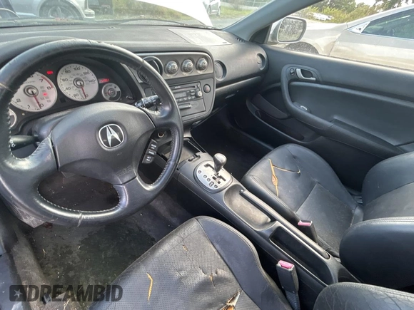 2004 Acura RSX z VIN JH4DC54874S003217, wystawiony jako Copart lot #51871005 z przebiegiem 133 903 mil mil oraz Czysty tytuł • Clean title. Historia ofert i sprzedaży dostępna na DreamBid. Obrazek 9.