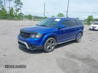 2015 Dodge Journey Crossroad with VIN 3C4PDCGG9FT617772, listed as a IAAI auction lot 42123413 with 146,778 mi miles and . Bid and sale history available at DreamBid. Image 2.