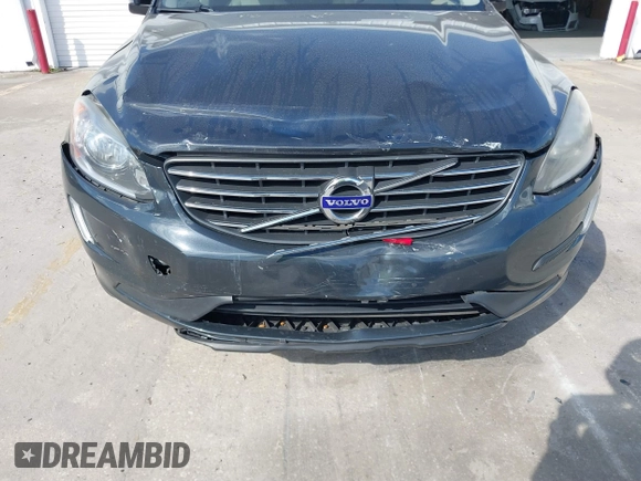 2015 Volvo XC60 T5 Drive-E Premier Plus with VIN YV440MDC7F2606774, listed as a IAAI auction lot 41564034 with 166,758 mi miles. Bid and sale history available at carsss.com. Image 6.