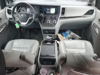 2017 Toyota Sienna with VIN 5TDDZ3DC9HS161212, listed as a Copart auction lot 50129845 with 104,020 mi miles and Salvage Title. Bid and sale history available at DreamBid. Image 8.