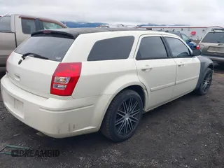 2005 Dodge Magnum z VIN 2D4FV48T35H554768, wystawiony jako IAAI lot #41885869 z przebiegiem 198 196 mil mil oraz . Historia ofert i sprzedaży dostępna na DreamBid. Obrazek 4.