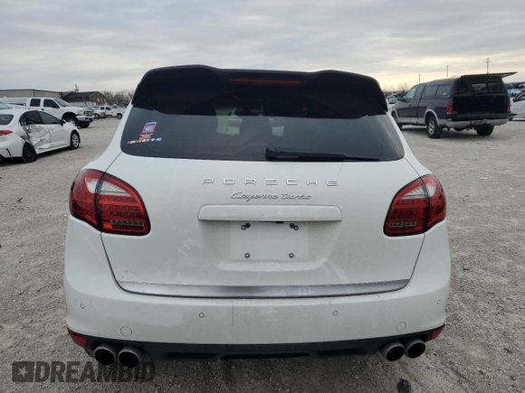 2012 Porsche Cayenne Turbo z VIN WP1AC2A23CLA83951, wystawiony jako Copart lot #82380594 z przebiegiem Nie podano mil oraz Szkoda całkowita • Salvage title. Historia ofert i sprzedaży dostępna na DreamBid. Obrazek 6.