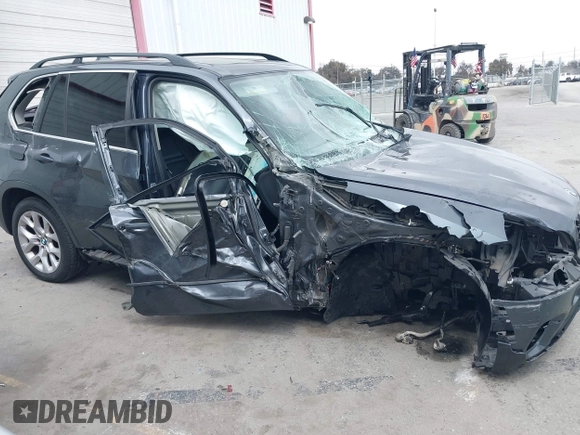 2013 BMW X5 xDrive35i z VIN 5UXZV4C57D0E04976, wystawiony jako IAAI lot #42111435 z przebiegiem 160 226 mil mil oraz . Historia ofert i sprzedaży dostępna na DreamBid. Obrazek 6.