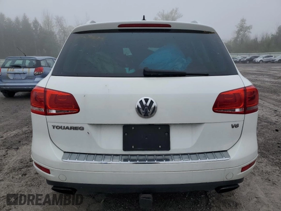 2012 Volkswagen Touareg Sport with VIN WVGEF9BP2CD010668, listed as a Copart auction lot 55306485 with 166,255 mi miles and Clean Title. Bid and sale history available at DreamBid. Image 6.
