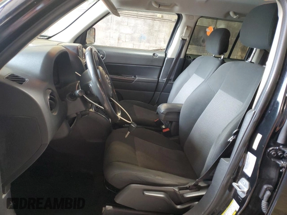 2014 Jeep Patriot Latitude with VIN 1C4NJPFB0ED890696, listed as a Copart auction lot 55581825 with 70,030 mi miles and Salvage title. Bid and sale history available at DreamBid. Image 7.