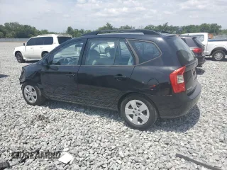 2009 Kia Rondo LX with VIN KNAFG528097250880, listed as a Copart auction lot 52632615 with 127,228 mi miles and Salvage Title. Bid and sale history available at carsss.com. Image 2.