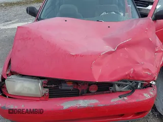 1993 Nissan Sentra z VIN 1N4EB32H7PC770697, wystawiony jako IAAI lot #41727754 z przebiegiem 210 152 mil mil oraz . Historia ofert i sprzedaży dostępna na DreamBid. Obrazek 6.