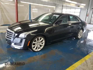 2015 Cadillac CTS Premium AWD z VIN 1G6AZ5S3XF0127669, wystawiony jako Copart lot #56314865 z przebiegiem 211 973 mil mil oraz Czysty tytuł • Clean title. Historia ofert i sprzedaży dostępna na DreamBid. Obrazek 1.
