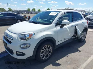 2016 FIAT 500X Lounge z VIN ZFBCFXDT0GP333273, wystawiony jako IAAI lot #42269130 z przebiegiem 98 707 mil mil oraz . Historia ofert i sprzedaży dostępna na DreamBid. Obrazek 2.
