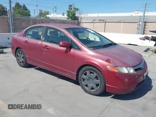 2006 Honda Civic LX with VIN JHMFA16566S006042, listed as a IAAI auction lot 42190965 with 152,233 mi miles and . Bid and sale history available at DreamBid. Image 1.