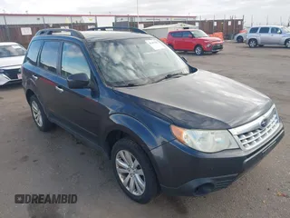 2011 Subaru Forester 2.5X Premium with VIN JF2SHBCC6BH705538, listed as a IAAI auction lot 41439382 with 214,376 mi miles. Bid and sale history available at carsss.com. Image 1.