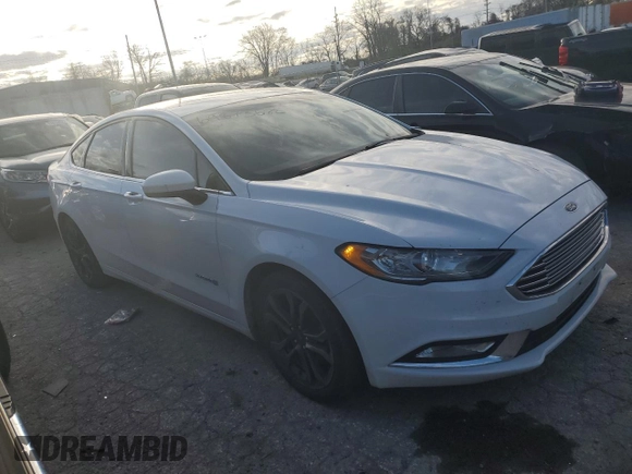 2018 Ford Fusion Hybrid SE with VIN 3FA6P0LU9JR132542, listed as a Copart auction lot 69873582 with 128,931 mi miles. Bid and sale history available at carsss.com. Image 4.