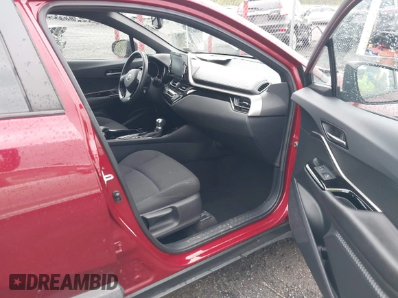 2019 Toyota C-HR XLE with VIN NMTKHMBX0KR088761, listed as a IAAI auction lot 42037328 with 28,501 mi miles and . Bid and sale history available at DreamBid. Image 5.