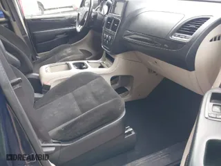 2015 Dodge Grand Caravan SXT Plus with VIN 2C4RDGCG7FR649032, listed as a IAAI auction lot 41825774 with 128,521 mi miles. Bid and sale history available at carsss.com. Image 5.