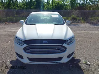 2014 Ford Fusion Titanium Hybrid with VIN 3FA6P0RU3ER279212, listed as a IAAI auction lot 42241465 with 155,841 mi miles and . Bid and sale history available at DreamBid. Image 6.