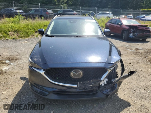 2018 Mazda CX-5 Grand Touring with VIN JM3KFBDM8J0342272, listed as a Copart auction lot 61930115 with 119,727 mi miles and Salvage title. Bid and sale history available at DreamBid. Image 5.