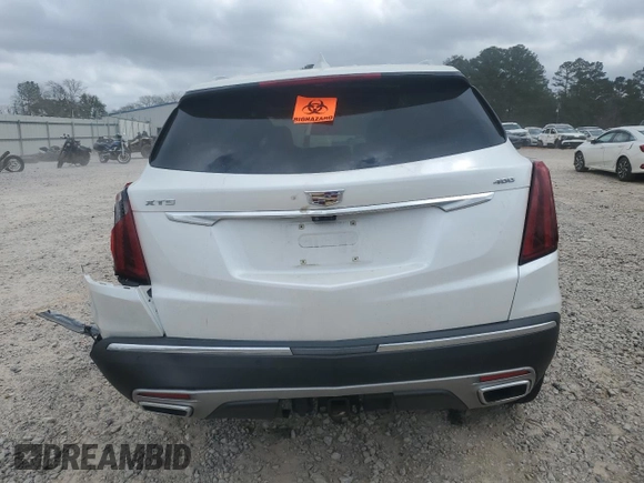 2022 Cadillac XT5 FWD Premium Luxury z VIN 1GYKNCRS5NZ174787, wystawiony jako Copart lot #47541075 z przebiegiem 31 357 mil mil oraz Szkoda całkowita • Salvage title. Historia ofert i sprzedaży dostępna na DreamBid. Obrazek 6.