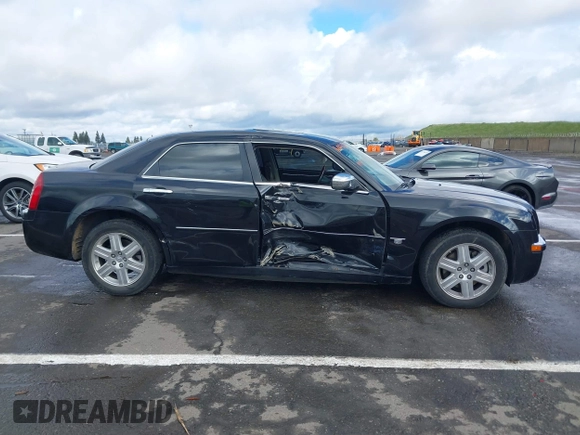 2006 Chrysler 300 C with VIN 2C3LK63H66H142437, listed as a IAAI auction lot 41751890 with 57,374 mi miles. Bid and sale history available at carsss.com. Image 13.