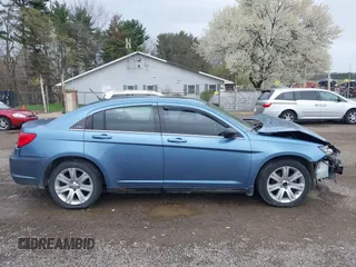 2011 Chrysler 200 Touring with VIN 1C3BC1FG3BN614903, listed as a IAAI auction lot 42048265 with 171,009 mi miles. Bid and sale history available at carsss.com. Image 14.