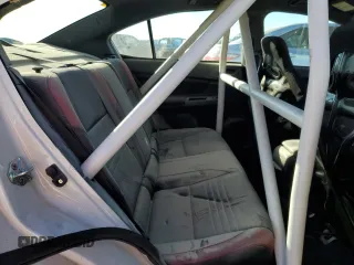 2016 Subaru WRX STI z VIN JF1VA2M64G9809798, wystawiony jako Copart lot #87480534 z przebiegiem 59 136 mil mil oraz Szkoda całkowita • Salvage title. Historia ofert i sprzedaży dostępna na DreamBid. Obrazek 10.