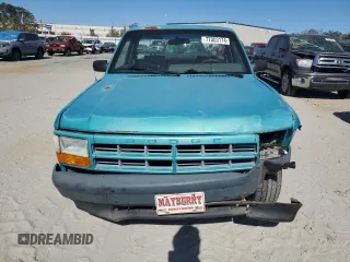 1996 Dodge Dakota with VIN 1B7FL26X9TW706385, listed as a Copart auction lot 77003174 with 146,228 mi miles and Salvage Title. Bid and sale history available at carsss.com. Image 5.