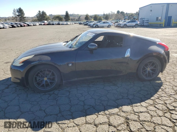 2012 Nissan 370Z Touring with VIN JN1AZ4EH4CM561432, listed as a Copart auction lot 89376935 with 128,955 mi miles and Salvage Title. Bid and sale history available at carsss.com. Image 1.