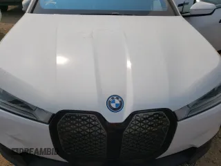 2023 BMW iX xDrive50 z VIN WB523CF03PCL70680, wystawiony jako Copart lot #52704593 z przebiegiem 1621 mil mil oraz . Historia ofert i sprzedaży dostępna na DreamBid. Obrazek 11.