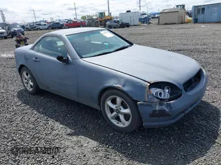 2003 Mercedes-Benz SLK 320 z VIN WDBKK65F63F282132, wystawiony jako IAAI lot #41965580 z przebiegiem 166 115 mil mil oraz . Historia ofert i sprzedaży dostępna na DreamBid. Obrazek 1.